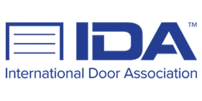 Logo of the International Door Association (IDA) featuring stylized door graphic and blue text, representing the professional organization related to garage door industry standards and services.