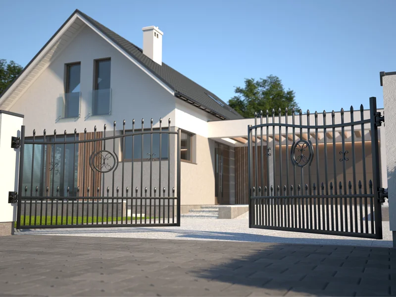 Residential swing gate operator in front of modern house, showcasing automated access and security features, highlighting Overhead Door Company of Fresno's customized gate solutions.