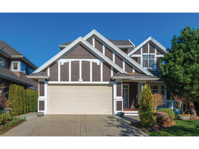 Modern residential home featuring a garage door, showcasing the potential for garage door transformations by Overhead Door Company of Fresno.